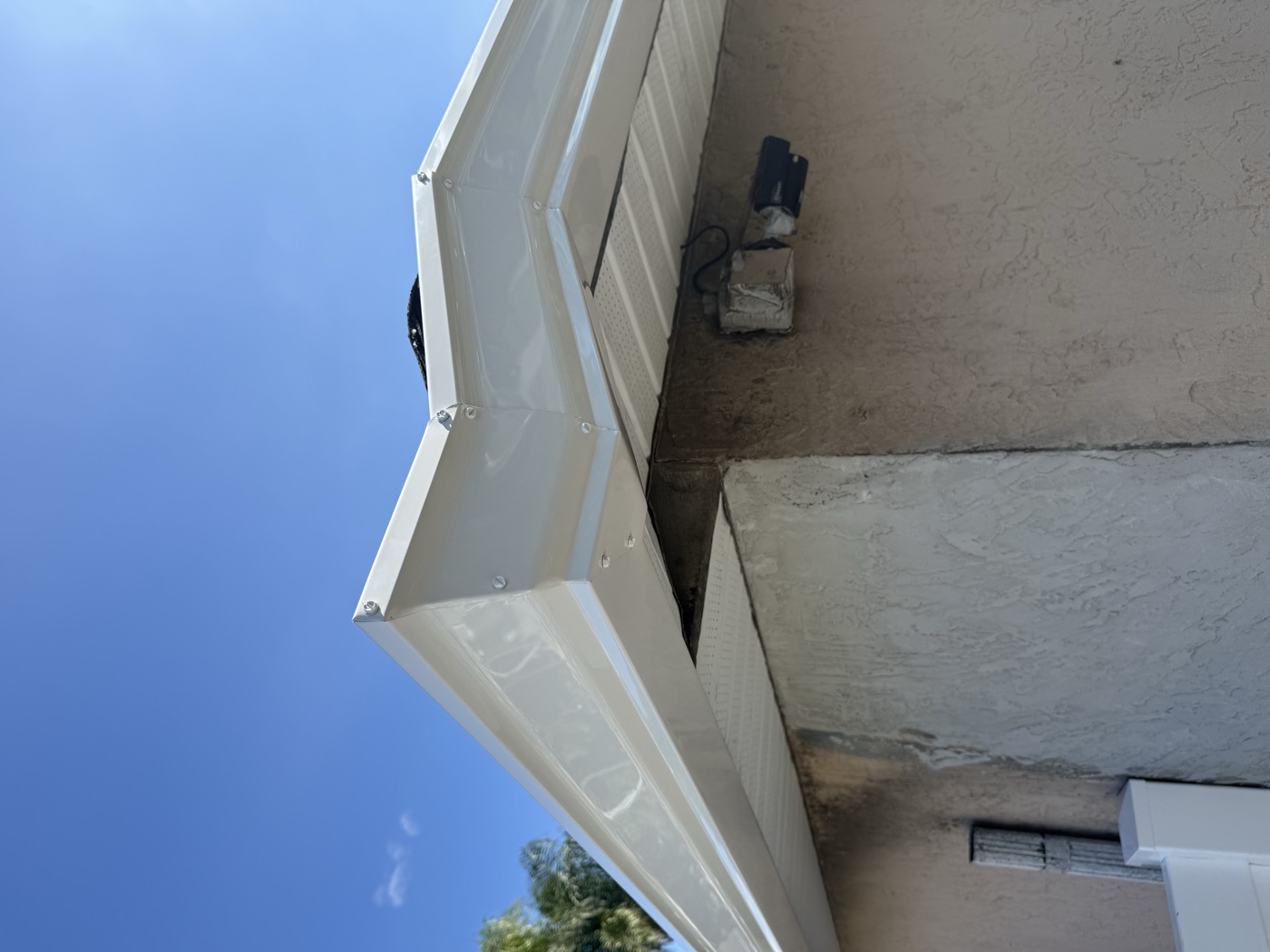 Clear gutter run and mitred corner after service