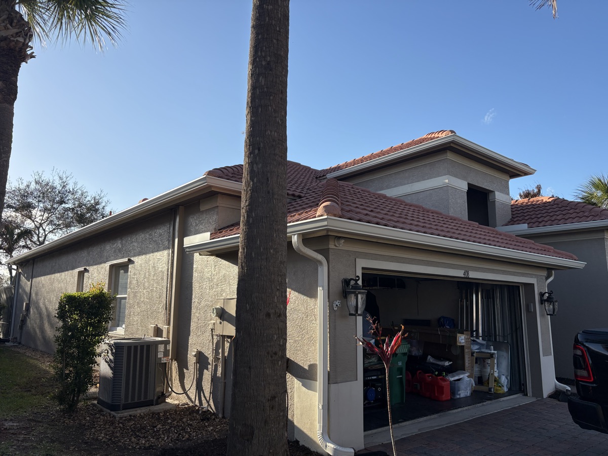 Tile-roof home, seamless gutter and downspout
