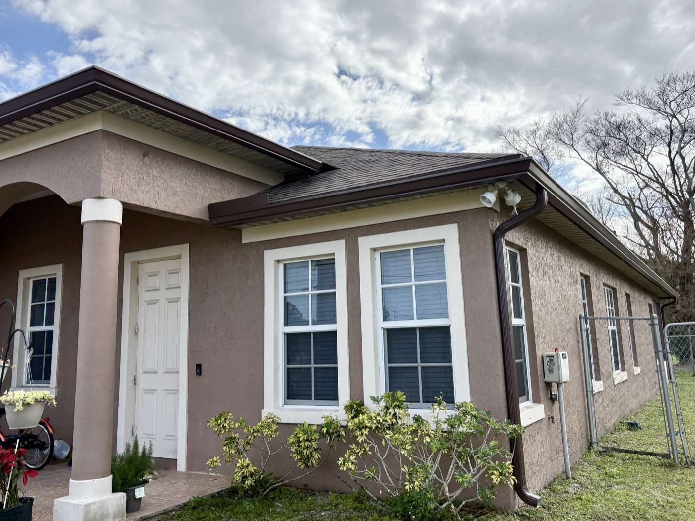 Single-story Treasure Coast home with gutters, Stronghold Gutters service area
